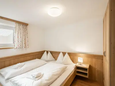Ein Bett oder Betten in einem Zimmer der Unterkunft Chalet Gnadenalm by Interhome