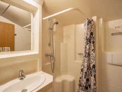 Ein Badezimmer in der Unterkunft Chalet Gnadenalm by Interhome