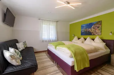 Ein Bett oder Betten in einem Zimmer der Unterkunft Trendapartment