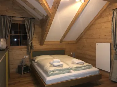 Ein Bett oder Betten in einem Zimmer der Unterkunft Mankerl Hütte Lachtal