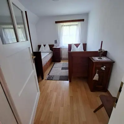 Ein Bett oder Betten in einem Zimmer der Unterkunft Ferienhaus Schlossblick