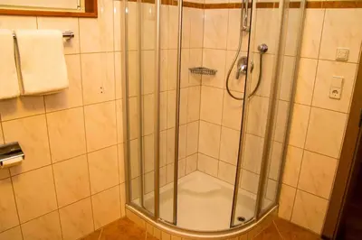 Ein Badezimmer in der Unterkunft Berghoam - inklusive Wasserwelt