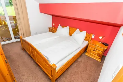 Ein Bett oder Betten in einem Zimmer der Unterkunft Berghoam - inklusive Wasserwelt