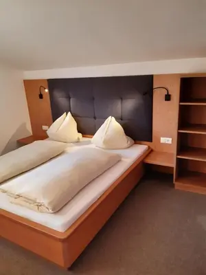 Ein Bett oder Betten in einem Zimmer der Unterkunft Haus Weitgasser