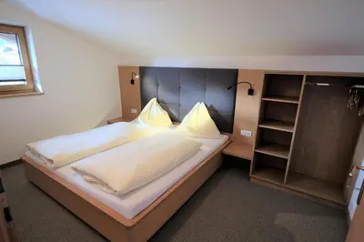 Ein Bett oder Betten in einem Zimmer der Unterkunft Haus Weitgasser