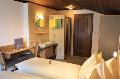 Ein Bett oder Betten in einem Zimmer der Unterkunft Gästehaus Oberauer