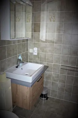 Ein Badezimmer in der Unterkunft Gästehaus Oberauer