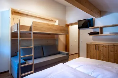 Ein Bett oder Betten in einem Zimmer der Unterkunft CHALET MONTIS