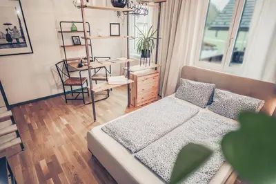 Ein Bett oder Betten in einem Zimmer der Unterkunft The Gallery
