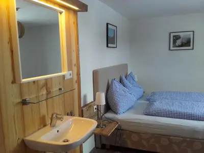 Ein Bett oder Betten in einem Zimmer der Unterkunft Oberbichlgut