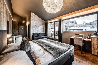 Ein Bett oder Betten in einem Zimmer der Unterkunft ALMMONTE SENSUM SUITES - Funky Living Hotel