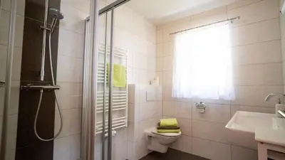 Ein Badezimmer in der Unterkunft Huberbauer