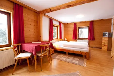 Ein Bett oder Betten in einem Zimmer der Unterkunft Gasthof - Pension Ödsteinblick