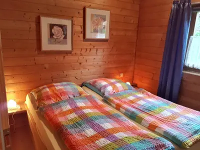 Ein Bett oder Betten in einem Zimmer der Unterkunft Milena-Hütte