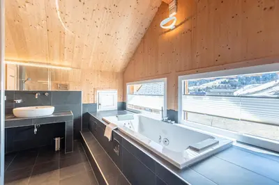 Ein Badezimmer in der Unterkunft Kreischberg Chalets by ALPS RESORTS