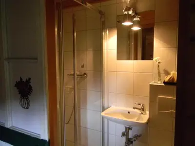Ein Badezimmer in der Unterkunft Hüttenferien Köberlhof