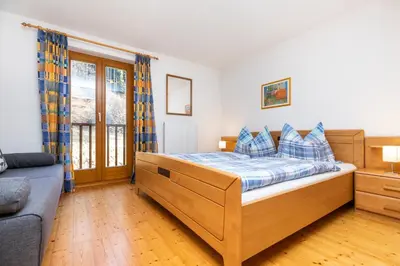 Ein Bett oder Betten in einem Zimmer der Unterkunft Ferienhaus Waldsicht