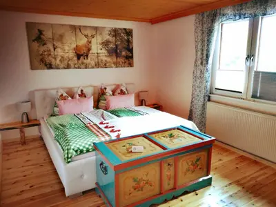 Ein Bett oder Betten in einem Zimmer der Unterkunft Haus Moni