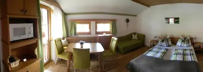 Ein Bett oder Betten in einem Zimmer der Unterkunft Landhaus Salzburg