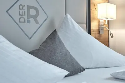 Ein Bett oder Betten in einem Zimmer der Unterkunft Rainerhof