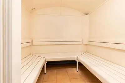 Ein Bett oder Betten in einem Zimmer der Unterkunft Hotel Garni Sonnhof