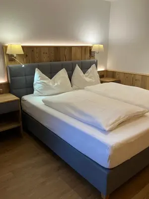 Ein Bett oder Betten in einem Zimmer der Unterkunft Haus Berge Appartements