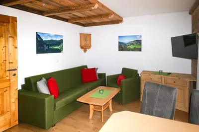 Ein Sitzbereich in der Unterkunft Haus Berge Appartements