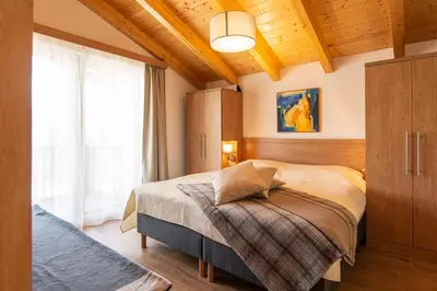 Ein Bett oder Betten in einem Zimmer der Unterkunft Apartment Dorf Wagrain Alpenleben by AlpenTravel