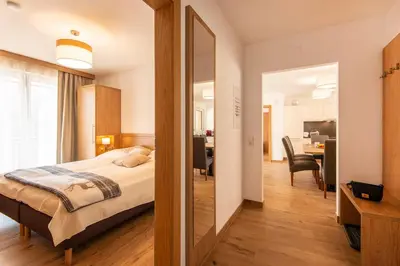 Ein Bett oder Betten in einem Zimmer der Unterkunft Apartment Dorf Wagrain Alpenleben by AlpenTravel