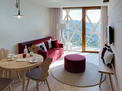 Ein Sitzbereich in der Unterkunft Falkensteiner Residences edelweiss