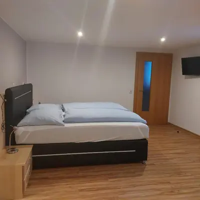 Ein Bett oder Betten in einem Zimmer der Unterkunft Hotel Wahlmüller