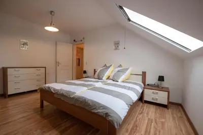 Ein Bett oder Betten in einem Zimmer der Unterkunft Ferienwohnung Michael