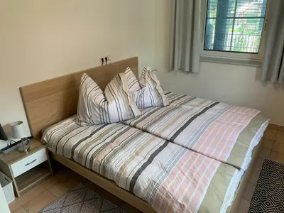 Ein Bett oder Betten in einem Zimmer der Unterkunft Ferienwohnung Michael