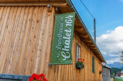 Ein Zertifikat, Auszeichnung, Logo oder anderes Dokument, das in der Unterkunft Chalet 164 ausgestellt ist