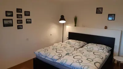 Ein Bett oder Betten in einem Zimmer der Unterkunft LaWie am Attersee