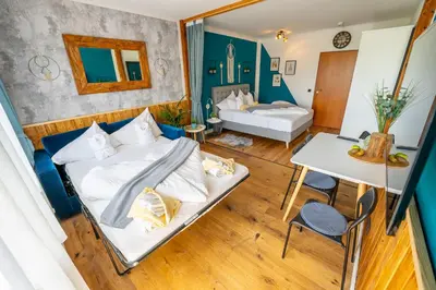 Ein Bett oder Betten in einem Zimmer der Unterkunft Appartement Stelo Gosau-Hallstatt