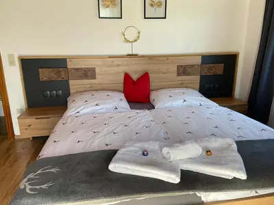 Ein Bett oder Betten in einem Zimmer der Unterkunft Haus Sperleiten