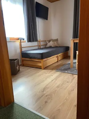 Ein Bett oder Betten in einem Zimmer der Unterkunft Haus Sperleiten