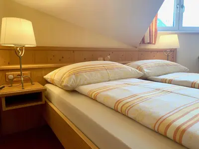 Ein Bett oder Betten in einem Zimmer der Unterkunft Kornbranntgut Hieflau