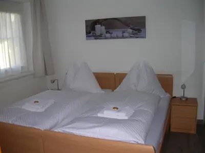Ein Bett oder Betten in einem Zimmer der Unterkunft Appartements Mantinger