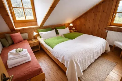 Ein Bett oder Betten in einem Zimmer der Unterkunft Chalet Steiermark