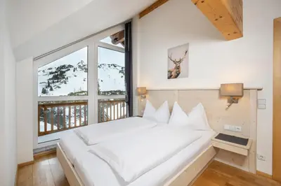 Ein Bett oder Betten in einem Zimmer der Unterkunft Appartement Haus Faßwald