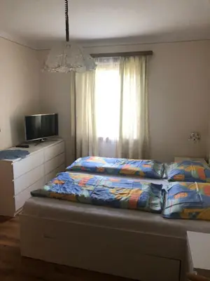 Ein Bett oder Betten in einem Zimmer der Unterkunft Mooswirt