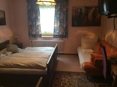 Ein Bett oder Betten in einem Zimmer der Unterkunft Mooswirt