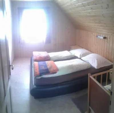 Ein Bett oder Betten in einem Zimmer der Unterkunft Riesner