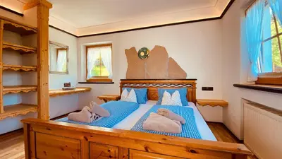 Ein Bett oder Betten in einem Zimmer der Unterkunft Bio Alpenhof Rostatt