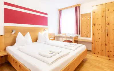 Ein Bett oder Betten in einem Zimmer der Unterkunft Landhaus Birgit