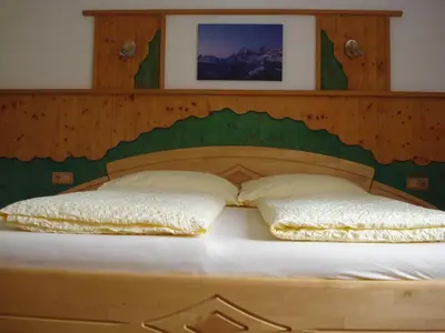 Ein Bett oder Betten in einem Zimmer der Unterkunft Appartement Ahornegger