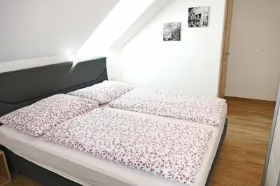 Ein Bett oder Betten in einem Zimmer der Unterkunft Appartement Mauterndorf