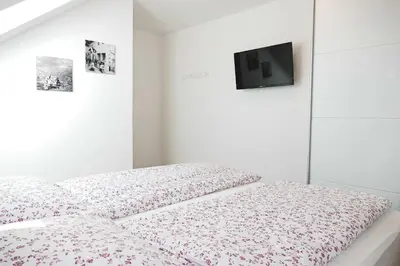 Ein Bett oder Betten in einem Zimmer der Unterkunft Appartement Mauterndorf